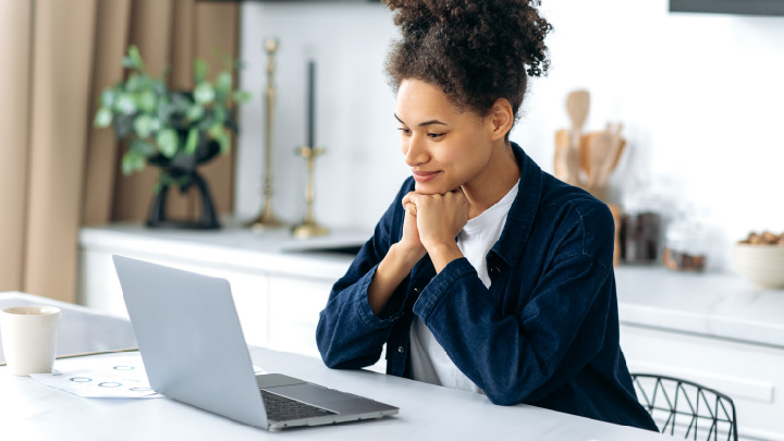 Woman looking at a computer