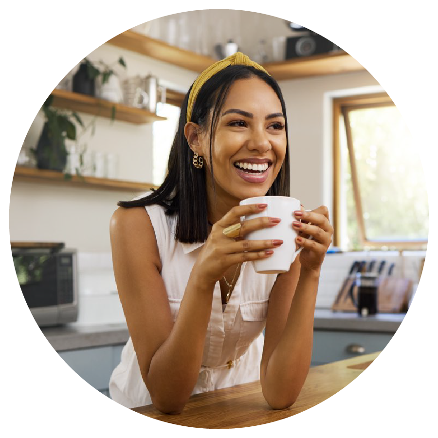 Woman smiling with coffee