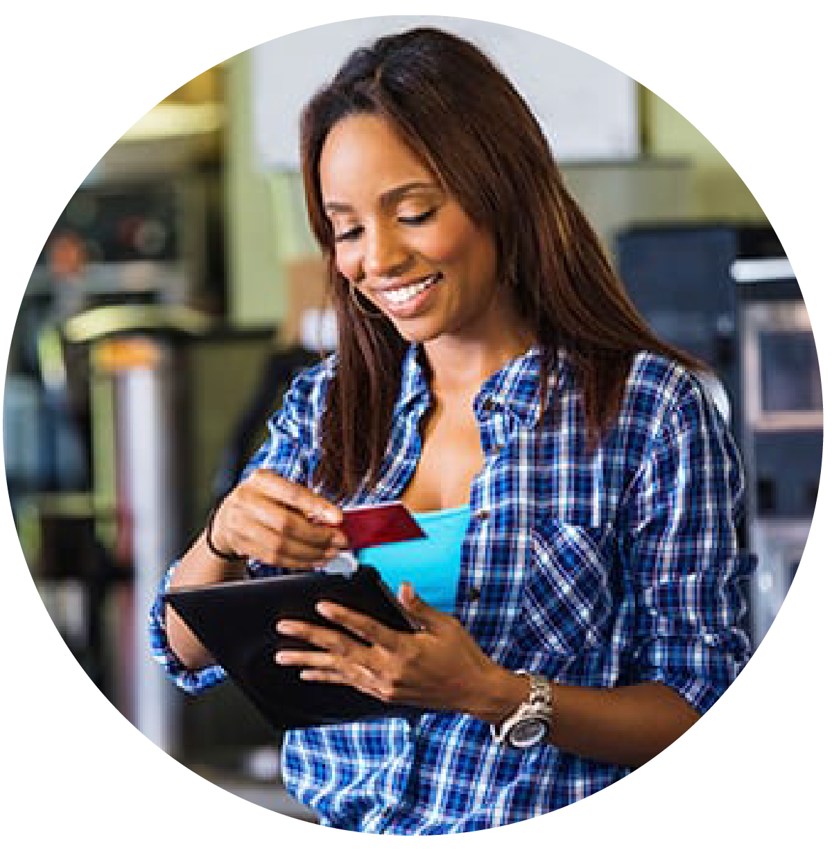 Woman using her credit card to pay