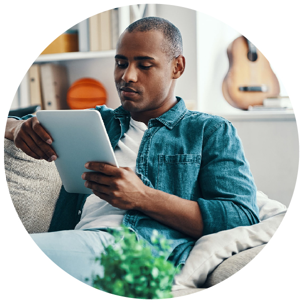 Man looking at tablet